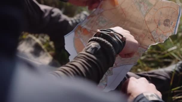 Close Hands Couple Tourists Hold Piece Paper Map Check Route — Stok Video