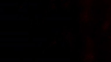 Siyah Arkaplan Karşısında Parlak Turuncu Flaşlı Şekillerin Hareketlerini Kapat