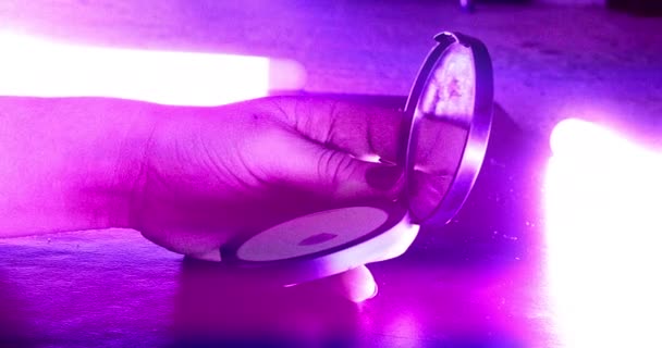 Close Shot Woman Holding Compact Mirror Make Surrounded Purple Light — Stok Video