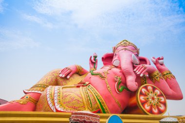 Pink Ganesha in relaxing protrait on blue sky clipart
