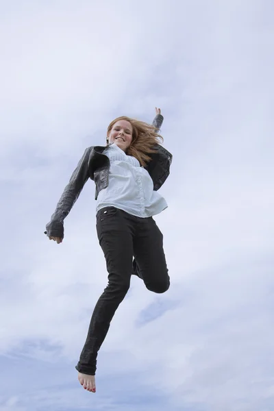 Springen in de lucht Stockfoto