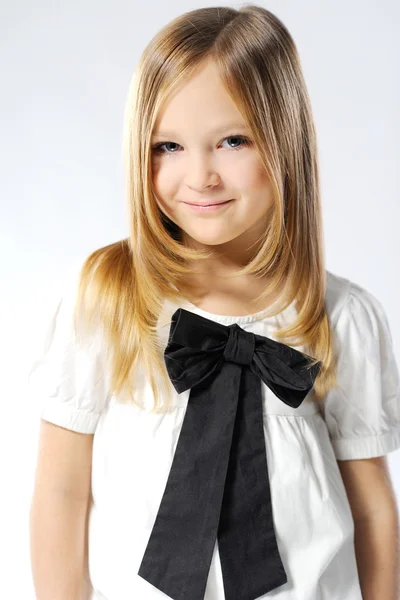 Stylish little girl in the studio — Stock Photo, Image