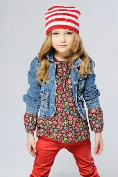 Stylish little girl in the studio — Stock Photo, Image