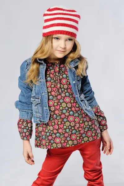 Stylish little girl in the studio — Stock Photo, Image