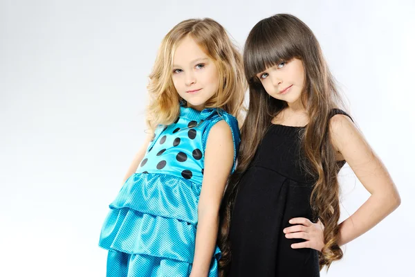 Portrait of two girls in the studio — Stock Photo, Image