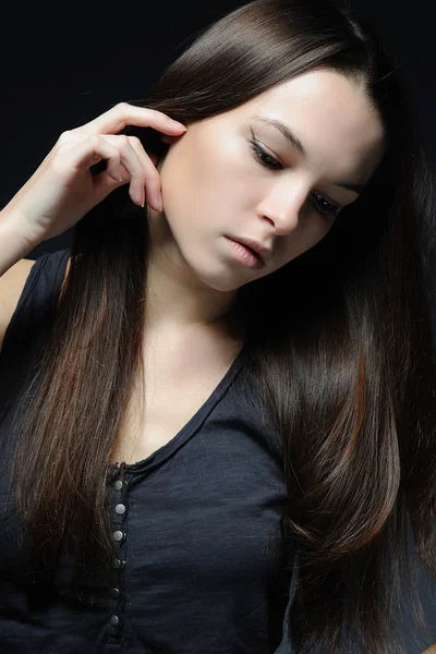 Portrait of a beautiful girl in studio — Stock Photo, Image