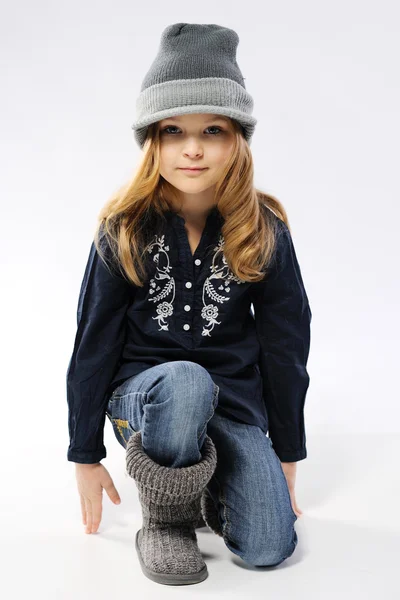 Stylish little girl in the studio — Stock Photo, Image