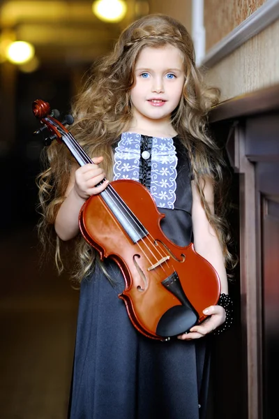 Portrait of a little girl with a violin — Stock Photo, Image