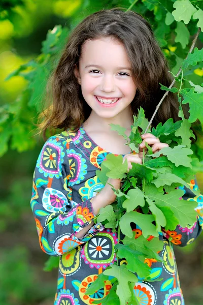 Portrait of little girl outdoors in summer — Stock Photo, Image