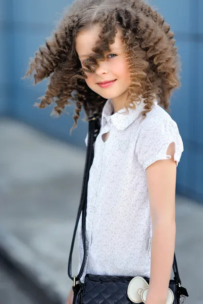 Portrait of little girl outdoors iin the city — Stock Photo, Image