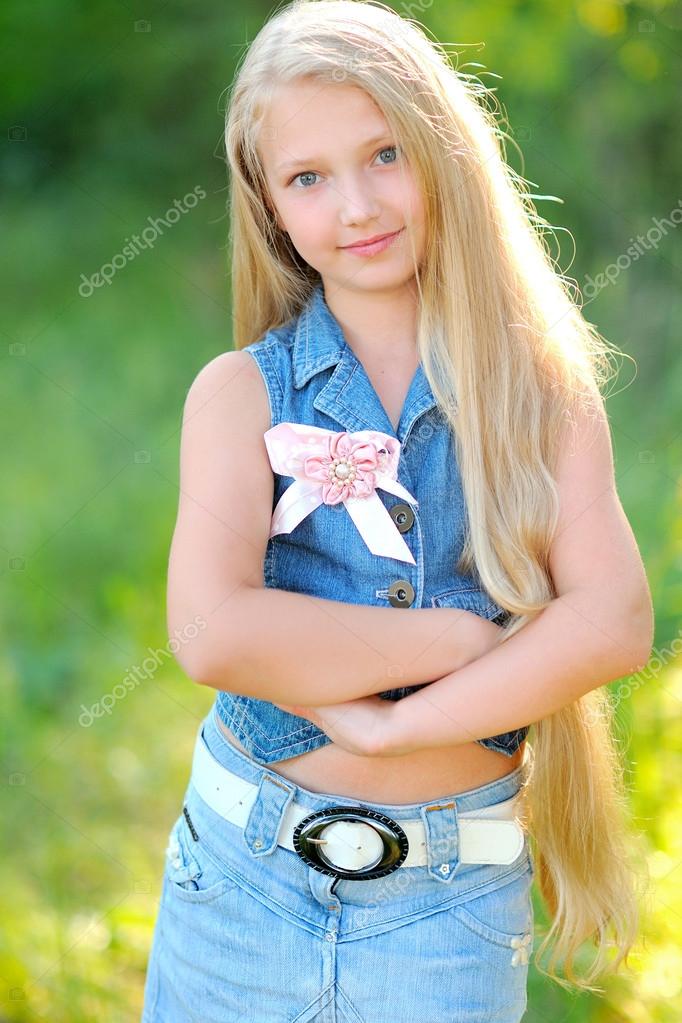 Portrait of little girl outdoors in summer Stock Photo by ©zagorodnaya ...