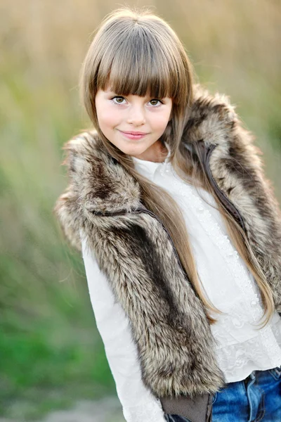 Portrait of a beautiful little brunette girl — Stock Photo, Image