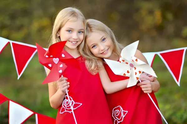 Portrait of two sisters with decor style Valentine's Day — Stock Photo, Image