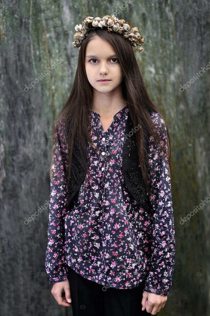 Portrait of a beautiful little brunette girl Stock Photo by ...