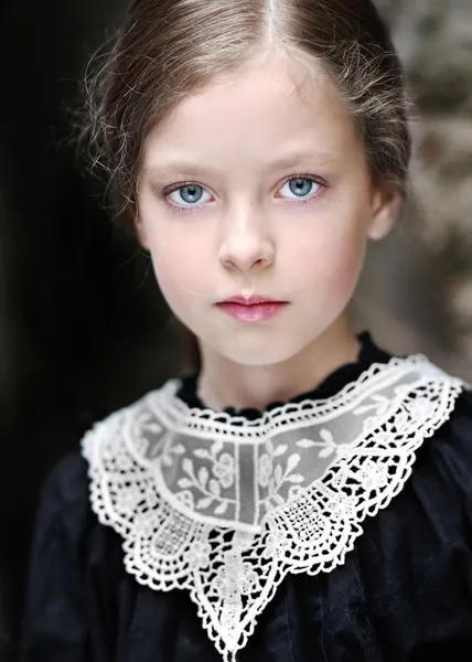 Portrait of a little girl in vintage style — Stock Photo, Image