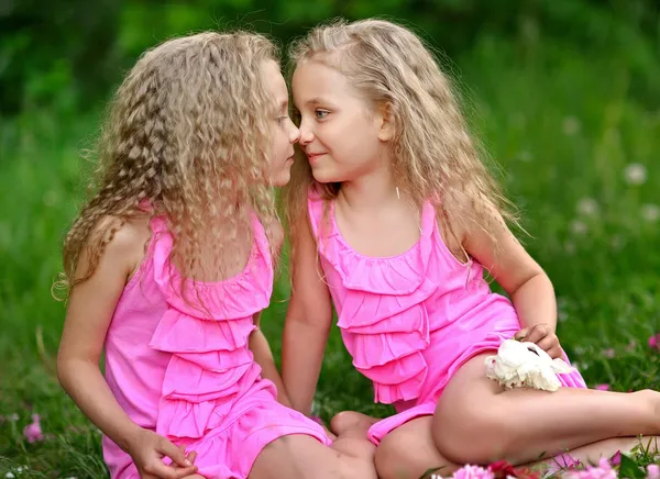 Portrait of two little girls twins — Stock Photo, Image