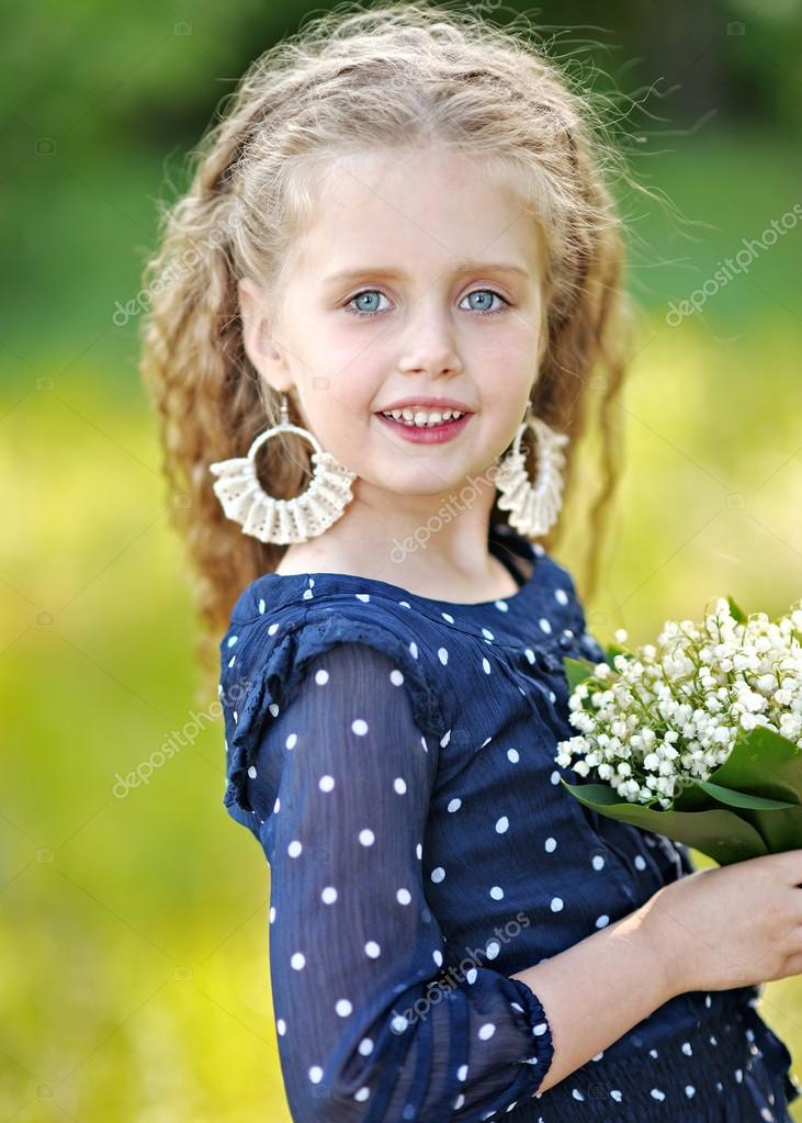 Portrait of little girl outdoors in summer Stock Photo by ©zagorodnaya ...