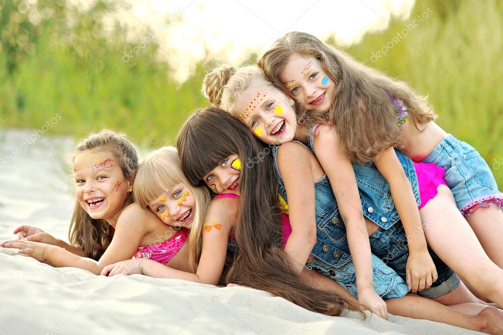 portrait of a cheerful child on the beach