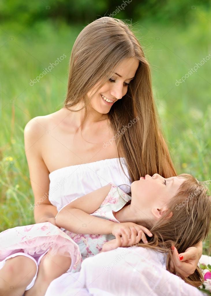portrait of mother and daughter in summer