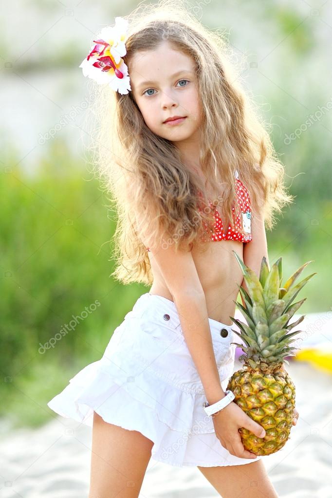 portrait of little girl on the beach