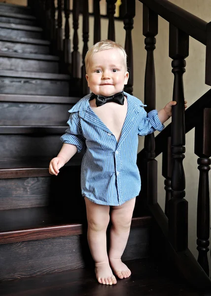 Portrait of a baby boy in a shirt at home — Stock Photo, Image