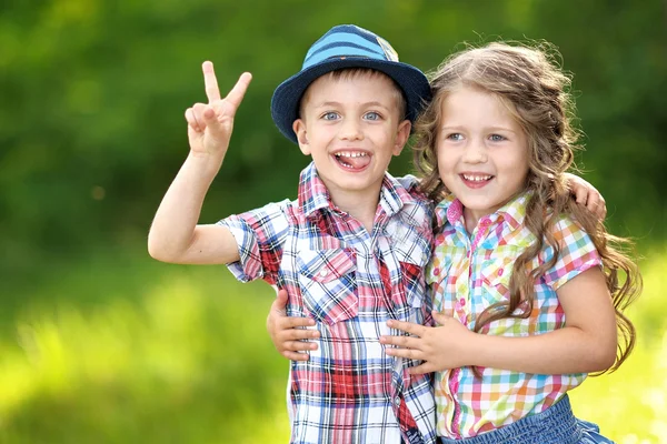 Portrait of a boy and girl in summer Royalty Free Stock Images