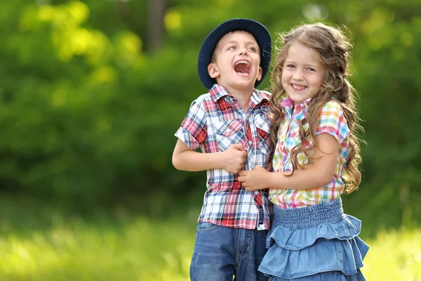 Portrait of a boy and girl in summer Stock Image