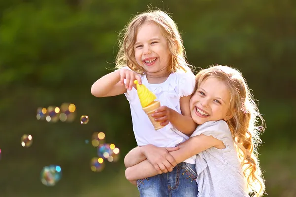 Portrait of two girls in the woods girlfriends — Stock Photo, Image