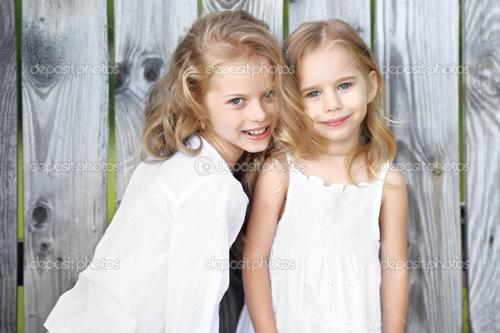 Portrait of two girls in the woods girlfriends