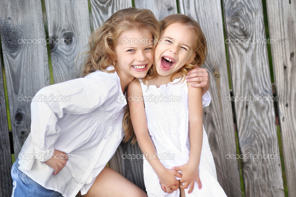 Portrait of two girls in the woods girlfriends