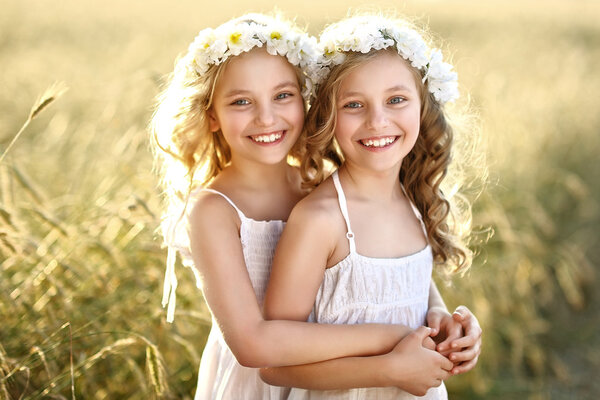 Portrait of two little girls twins
