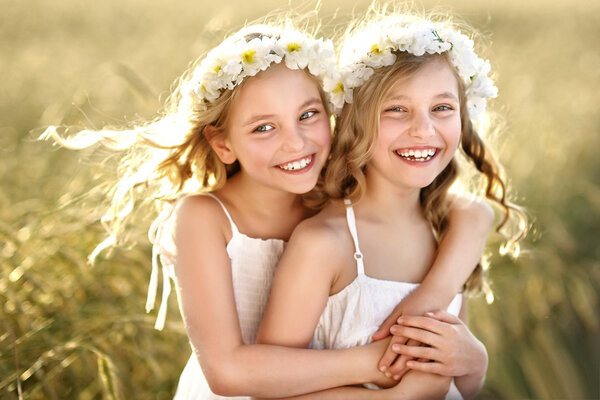 Portrait of two little girls twins
