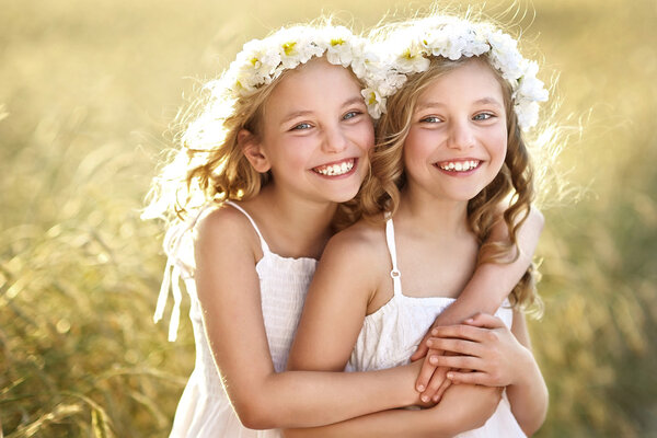 Portrait of two little girls twins