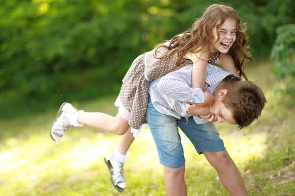 Portrait of a boy girl in a summer — Stock Photo, Image