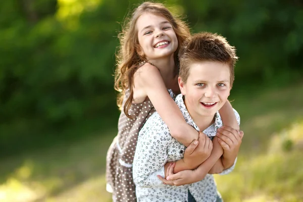 Portrait of a boy girl in a summer — Stock Photo, Image