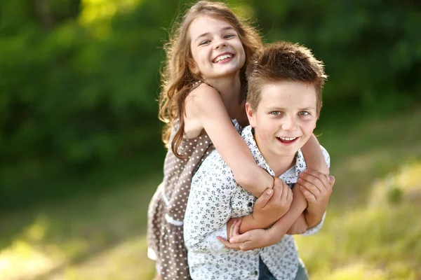 Portrait of a boy girl in a summer — Stock Photo, Image