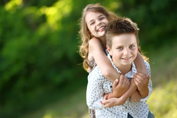 Portrait of a boy girl in a summer — Stock Photo, Image