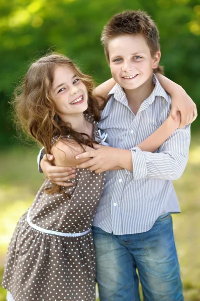 Portrait of a boy girl in a summer — Stock Photo, Image