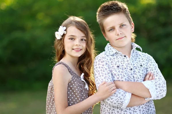 Portrait of a boy girl in a summer — Stock Photo, Image