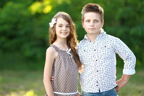 Portrait of a boy girl in a summer — Stock Photo, Image