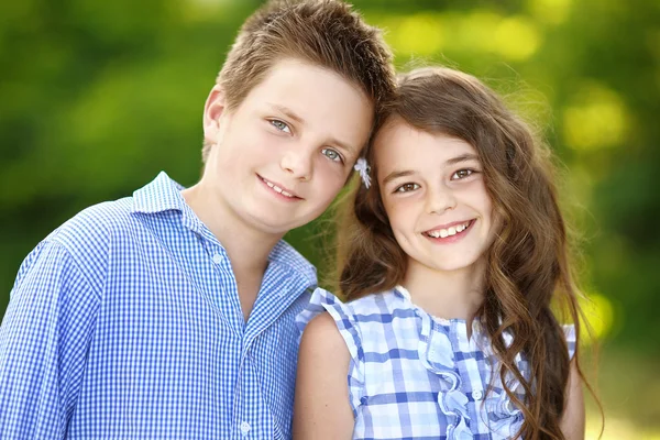 Portrait of a boy girl in a summer — Stock Photo, Image