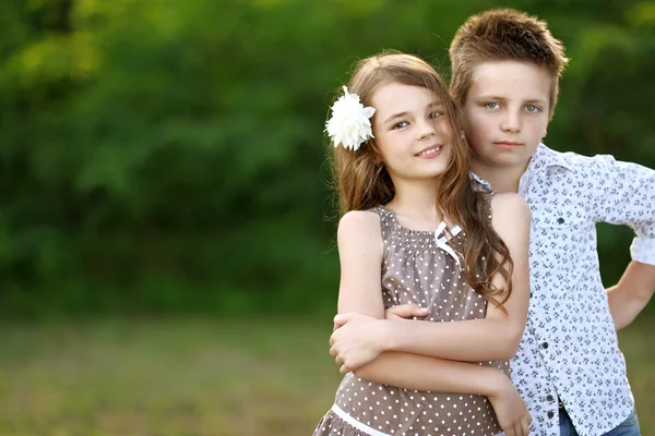 Portrait of a boy girl in a summer — Stock Photo, Image