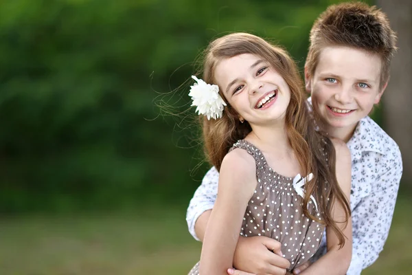 Portrait of a boy girl in a summer — Stock Photo, Image