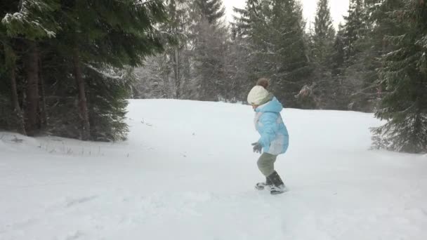 Side View Young Girl Speeding Snowy Hill Happy Female Kid — 图库视频影像