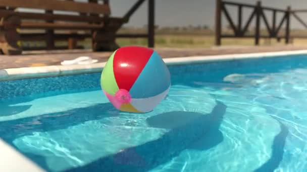 Cheerful Rainbow Bouncy Ball Floats Blown Wind Small Childrens Blue — Vídeo de Stock