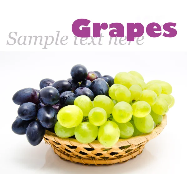 Ripe green and dark grape in the basket — Stock Photo, Image