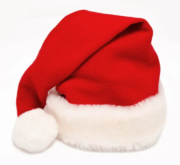 Único Papai Noel chapéu vermelho isolado no branco — Fotografia de Stock
