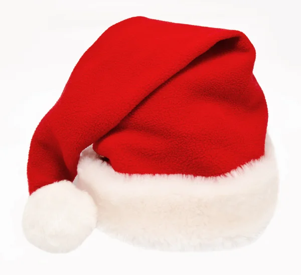 Único Papai Noel chapéu vermelho isolado no branco — Fotografia de Stock