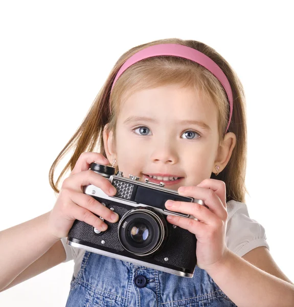 Dziewczynka z stary aparat na białym tle — Zdjęcie stockowe
