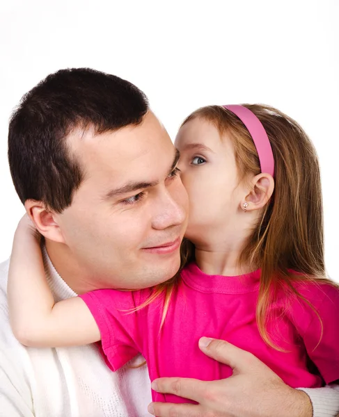 Klein meisje vertellen iets haar glimlachend vader geïsoleerd — Stockfoto